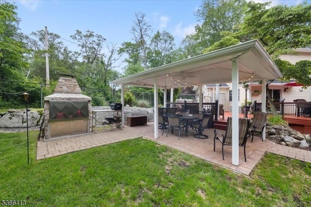 19 Elm St, Wanaque Boro, NJ 07420 - view of patio / terrace featuring exterior fireplace and a deck