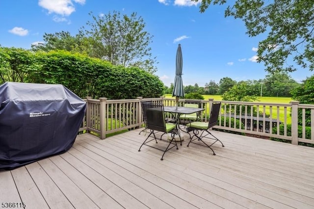 10 Cedarview Ct, Hillsborough Twp, NJ 08844 - wooden deck with outdoor dining space, a grill, and view of scattered trees