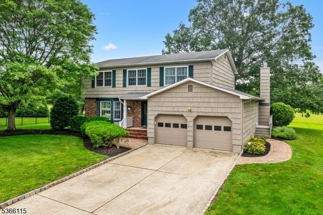 10 Cedarview Ct, Hillsborough Twp, NJ 08844 - traditional-style house with an attached garage, a chimney, a front lawn, driveway, and brick siding