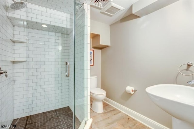 109 Chatham St, Chatham Boro, NJ 07928 - bathroom featuring a stall shower and wood finished floors