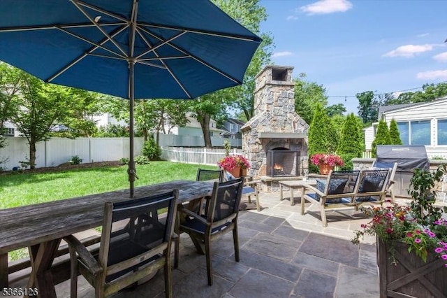 109 Chatham St, Chatham Boro, NJ 07928 - fenced backyard with an outdoor stone fireplace, a patio area, and outdoor dining area