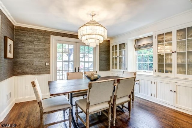 109 Chatham St, Chatham Boro, NJ 07928 - dining room with a chandelier, dark wood-style flooring, a wainscoted wall, and crown molding