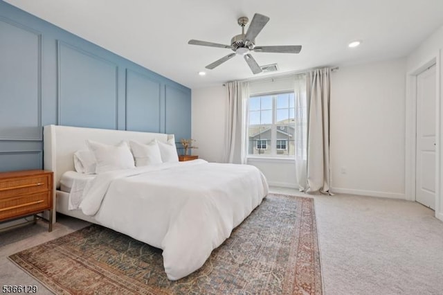 12 Colgate Dr, Morris Twp, NJ 07960 - bedroom featuring light colored carpet, a decorative wall, recessed lighting, and ceiling fan
