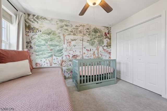 12 Colgate Dr, Morris Twp, NJ 07960 - carpeted bedroom featuring a closet, a wall unit AC, a ceiling fan, and wallpapered walls