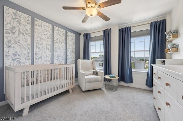 12 Colgate Dr, Morris Twp, NJ 07960 - carpeted bedroom with a crib and ceiling fan