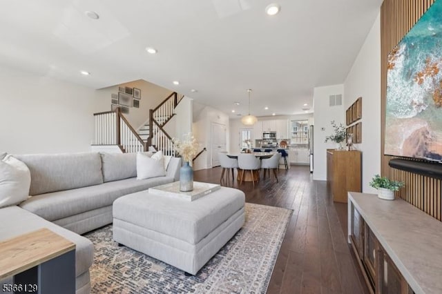 12 Colgate Dr, Morris Twp, NJ 07960 - living area featuring stairs, dark wood-style flooring, and recessed lighting