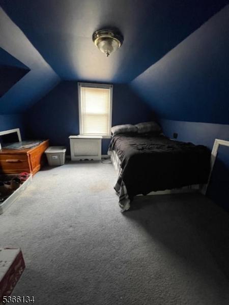 136 N 21st St, Kenilworth Boro, NJ 07033 - carpeted bedroom with vaulted ceiling