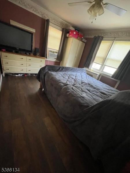 136 N 21st St, Kenilworth Boro, NJ 07033 - bedroom featuring dark wood-type flooring and a ceiling fan