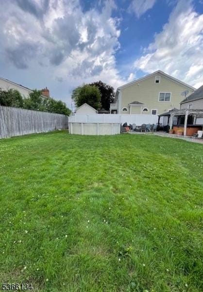 136 N 21st St, Kenilworth Boro, NJ 07033 - fenced backyard with a jacuzzi