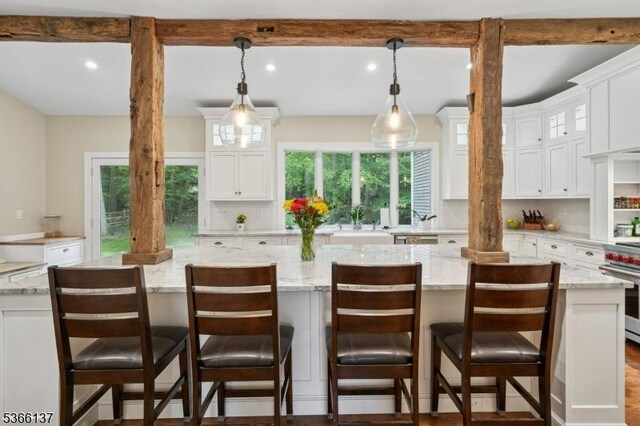 4 Knollwood Ln, Hardyston Twp, NJ 07460 - kitchen featuring stainless steel range, recessed lighting, white cabinetry, glass insert cabinets, and pendant lighting