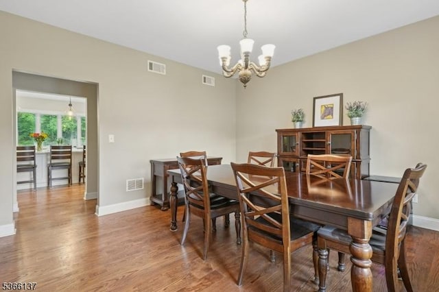 4 Knollwood Ln, Hardyston Twp, NJ 07460 - dining space with a chandelier and wood finished floors