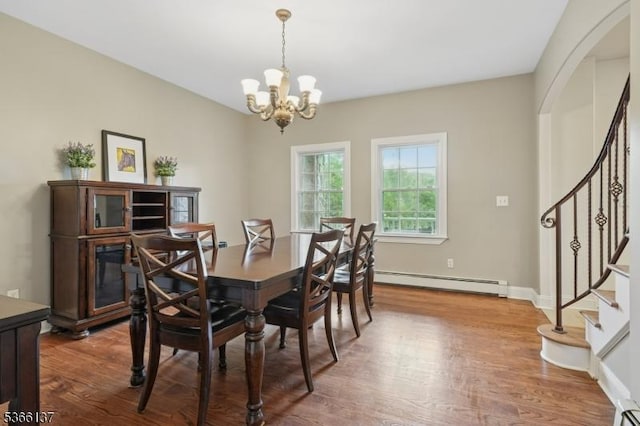 4 Knollwood Ln, Hardyston Twp, NJ 07460 - dining space with baseboard heating, stairway, a chandelier, and wood finished floors