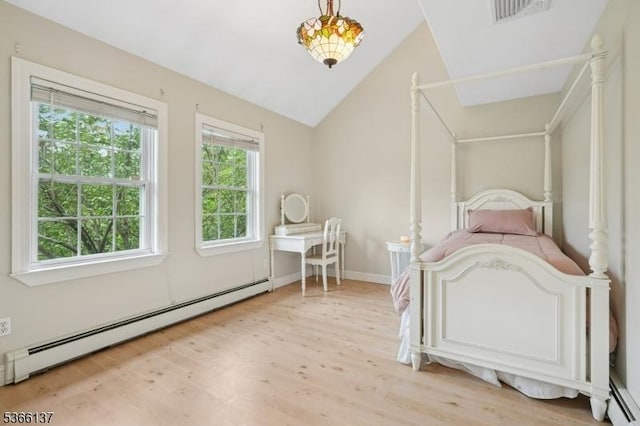 4 Knollwood Ln, Hardyston Twp, NJ 07460 - bedroom with a baseboard heating unit, light wood finished floors, and lofted ceiling