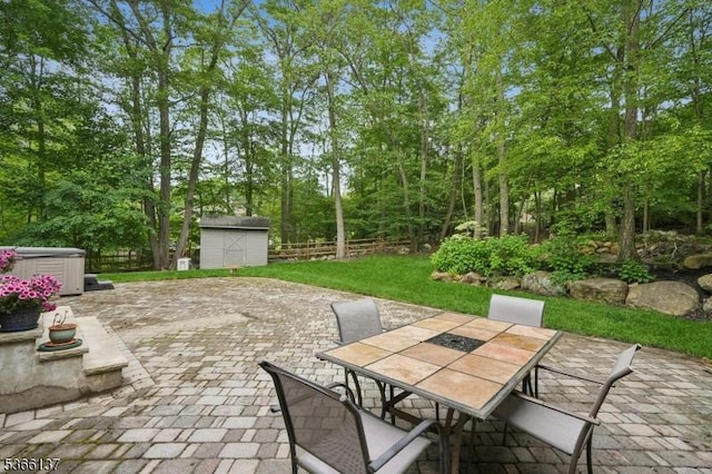 4 Knollwood Ln, Hardyston Twp, NJ 07460 - fenced backyard with a storage unit, a patio area, and outdoor dining space