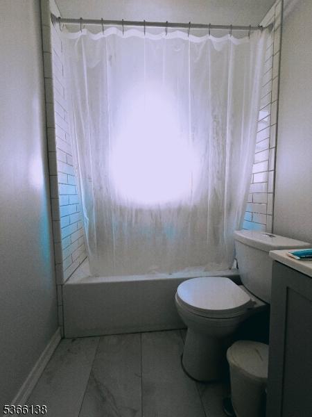 453 Beardsley Ave, Bloomfield Twp, NJ 07003 - bathroom featuring shower / bath combo, vanity, and tile patterned floors