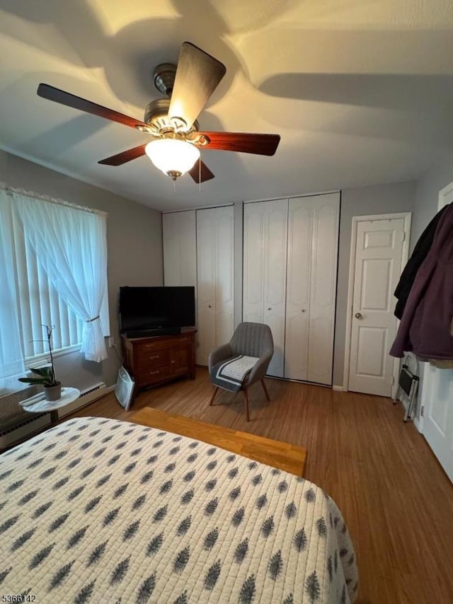 472B Thornbury Ct, Lakewood Twp, NJ 08701 - bedroom featuring two closets, wood finished floors, and a ceiling fan