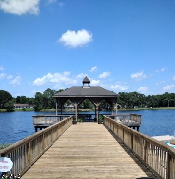 472B Thornbury Ct, Lakewood Twp, NJ 08701 - dock area with a gazebo and a water view