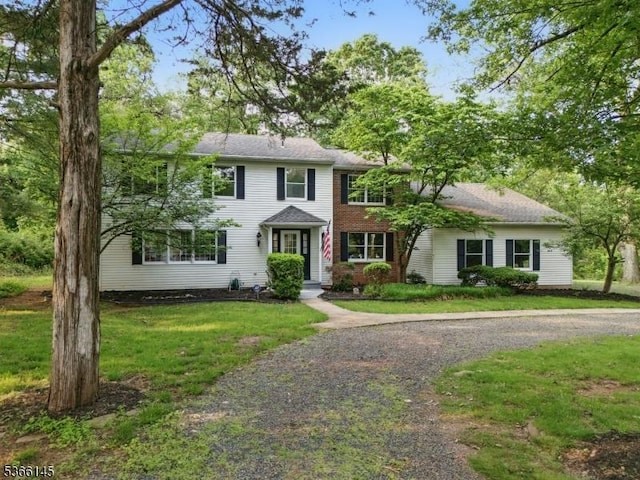 463 Garretson Rd, Bridgewater Twp, NJ 08807 - colonial-style house featuring a front lawn