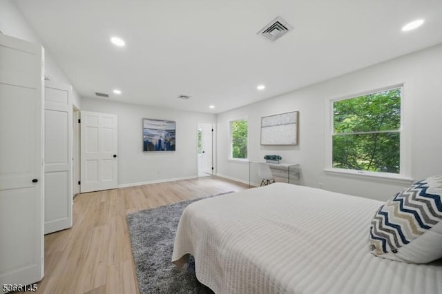 463 Garretson Rd, Bridgewater Twp, NJ 08807 - bedroom with light wood-type flooring and recessed lighting