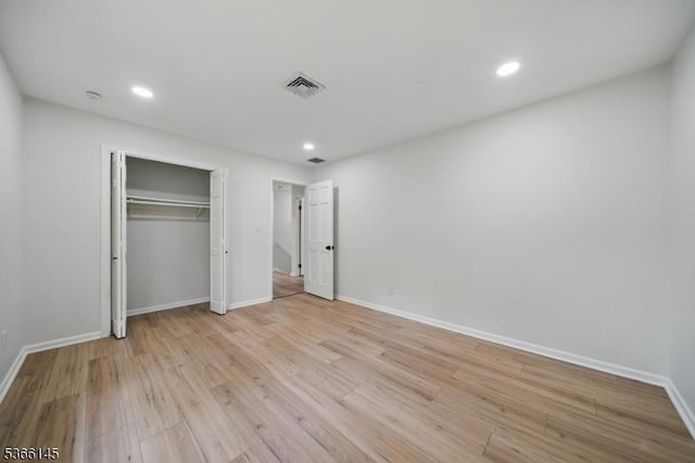 463 Garretson Rd, Bridgewater Twp, NJ 08807 - unfurnished bedroom with light wood finished floors, recessed lighting, and a closet