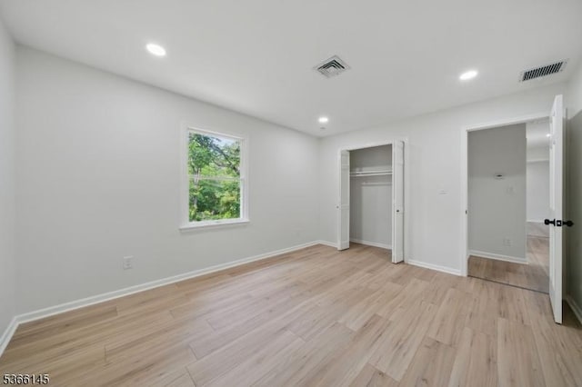 463 Garretson Rd, Bridgewater Twp, NJ 08807 - unfurnished bedroom featuring light wood-style floors, recessed lighting, and a closet
