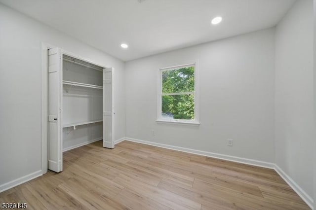 463 Garretson Rd, Bridgewater Twp, NJ 08807 - unfurnished bedroom with light wood finished floors, recessed lighting, and a closet