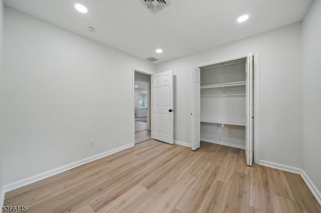 463 Garretson Rd, Bridgewater Twp, NJ 08807 - unfurnished bedroom featuring light wood-style floors, recessed lighting, and a closet