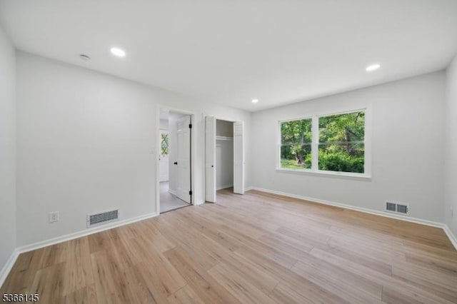 463 Garretson Rd, Bridgewater Twp, NJ 08807 - unfurnished bedroom with light wood finished floors, recessed lighting, and a closet