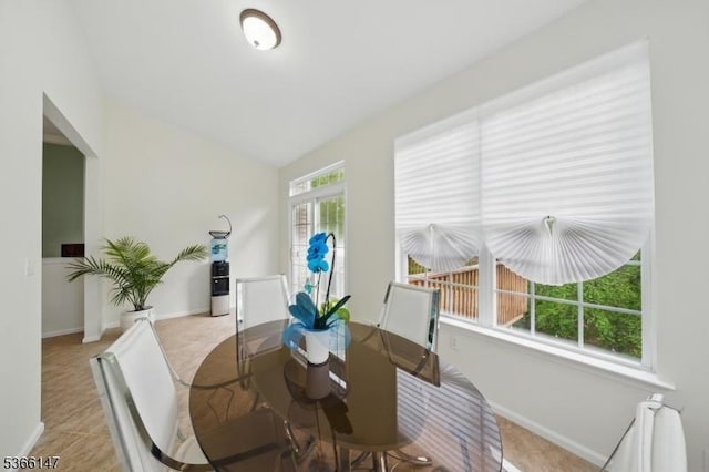 43 Saunders Ln, Mount Olive Twp, NJ 07840 - dining room featuring vaulted ceiling and baseboards