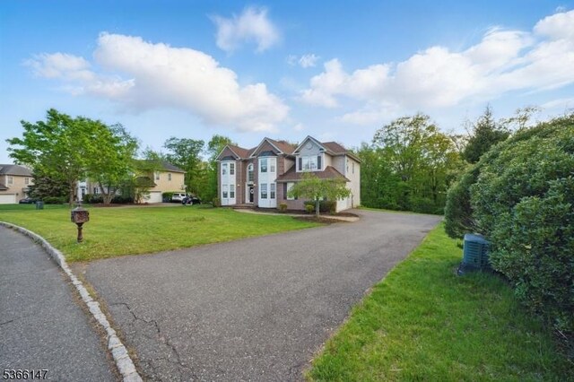 43 Saunders Ln, Mount Olive Twp, NJ 07840 - view of front of home featuring a front yard and driveway