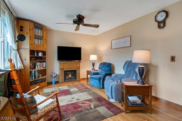 26 Mitchell St, Belleville Twp, NJ 07109 - living room featuring a ceiling fan, wood finished floors, and a glass covered fireplace