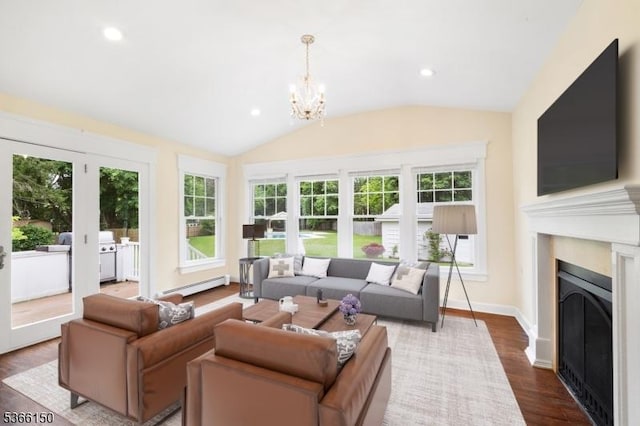 52 E Ave, Washington Twp, NJ 07840 - living area featuring a baseboard heating unit, a fireplace, dark wood-type flooring, a chandelier, and recessed lighting