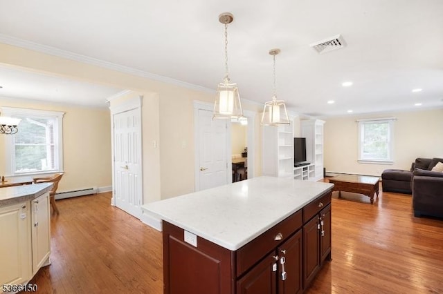52 E Ave, Washington Twp, NJ 07840 - kitchen with baseboard heating, open floor plan, light countertops, light wood-style floors, and crown molding
