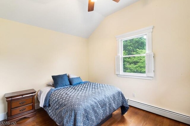 52 E Ave, Washington Twp, NJ 07840 - bedroom with a baseboard heating unit, lofted ceiling, wood finished floors, and a ceiling fan