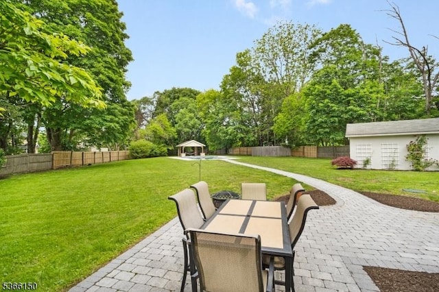 52 E Ave, Washington Twp, NJ 07840 - view of patio featuring a gazebo, outdoor dining area, and view of wooded area