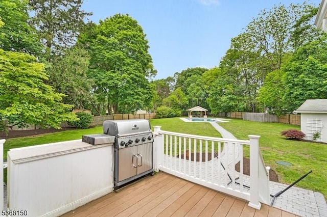 52 E Ave, Washington Twp, NJ 07840 - wooden terrace featuring a gazebo, a fenced backyard, view of scattered trees, and area for grilling