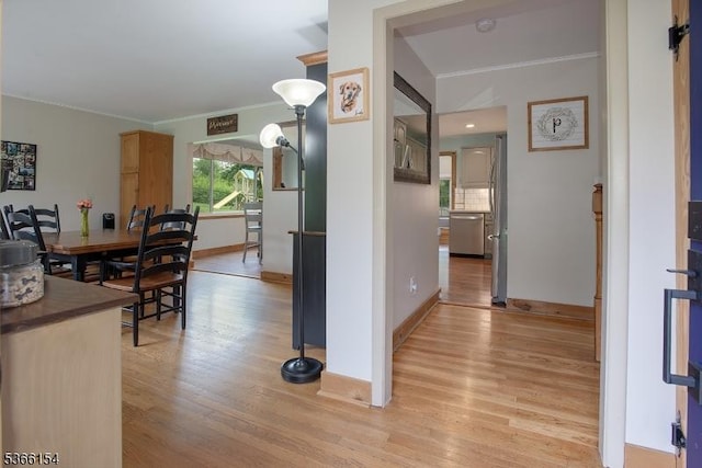 105 Rolling Acres Dr, Hampton Twp, NJ 07860 - dining room with light wood-type flooring and crown molding