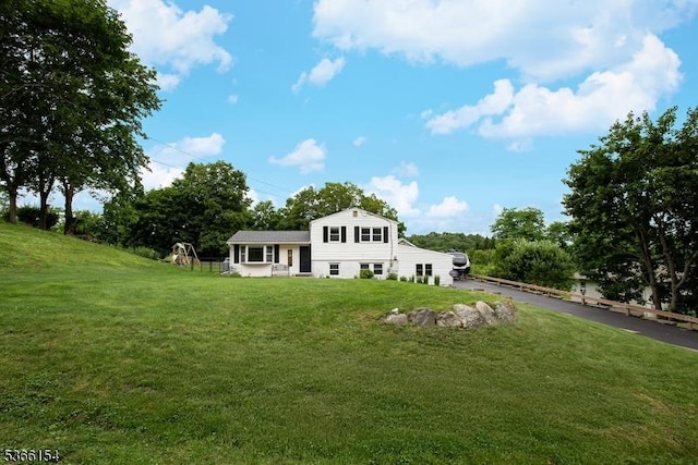 105 Rolling Acres Dr, Hampton Twp, NJ 07860 - rear view of house featuring a lawn