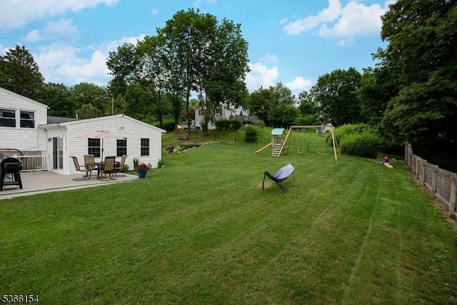 105 Rolling Acres Dr, Hampton Twp, NJ 07860 - view of yard featuring a patio area, a playground, and view of wooded area