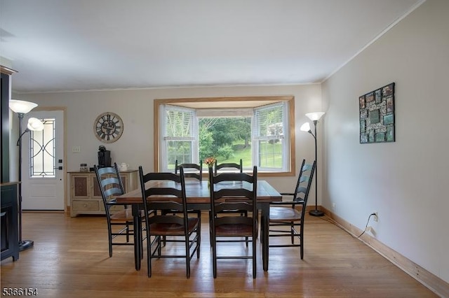 105 Rolling Acres Dr, Hampton Twp, NJ 07860 - dining space with crown molding and light wood finished floors