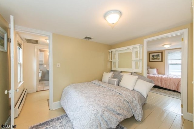6 Mc Clintock Pl, Parsippany-Troy Hills Twp, NJ 07878 - bedroom with a baseboard radiator and light wood-style flooring