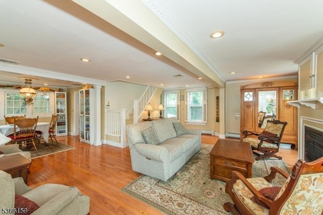 6 Mc Clintock Pl, Parsippany-Troy Hills Twp, NJ 07878 - living room featuring crown molding, stairs, a fireplace, light wood-type flooring, and recessed lighting