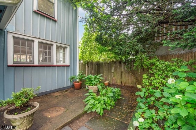 6 Mc Clintock Pl, Parsippany-Troy Hills Twp, NJ 07878 - view of side of home with board and batten siding and a patio area