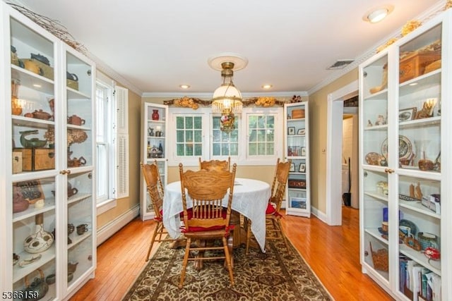 6 Mc Clintock Pl, Parsippany-Troy Hills Twp, NJ 07878 - dining area with ornamental molding, plenty of natural light, light wood-type flooring, and baseboard heating