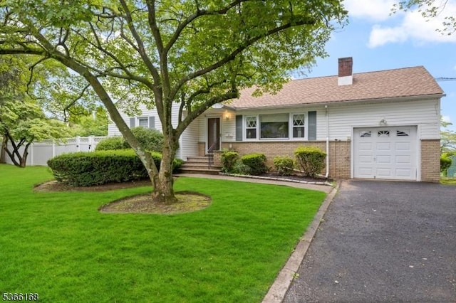 3 Casey Ave, East Hanover Twp, NJ 07936 - view of front of property with a chimney, a garage, brick siding, and driveway