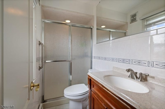 3 Casey Ave, East Hanover Twp, NJ 07936 - bathroom with vanity, a shower stall, tile walls, and backsplash