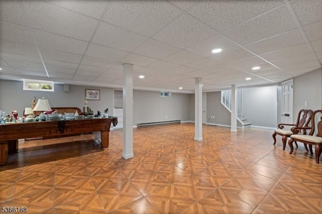 3 Casey Ave, East Hanover Twp, NJ 07936 - recreation room featuring a baseboard radiator, a paneled ceiling, and recessed lighting