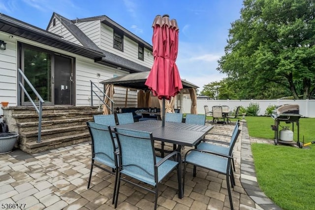 24 Roxbury Dr, Roxbury Twp, NJ 07847 - fenced backyard with area for grilling, a patio, outdoor dining space, and entry steps