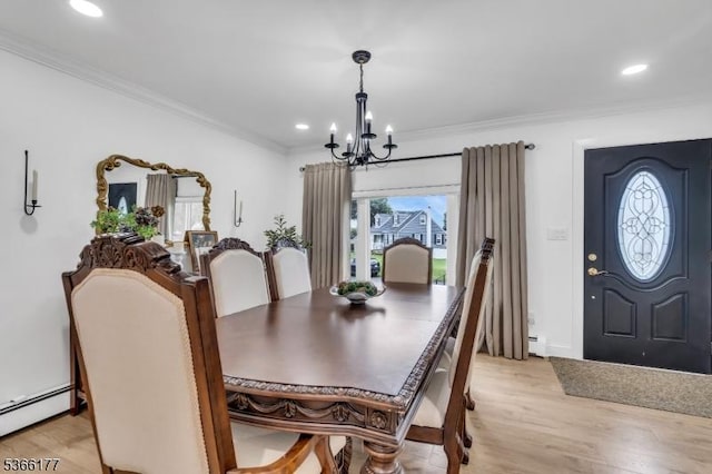 24 Roxbury Dr, Roxbury Twp, NJ 07847 - dining space featuring a chandelier, crown molding, baseboard heating, light wood-style floors, and a baseboard radiator