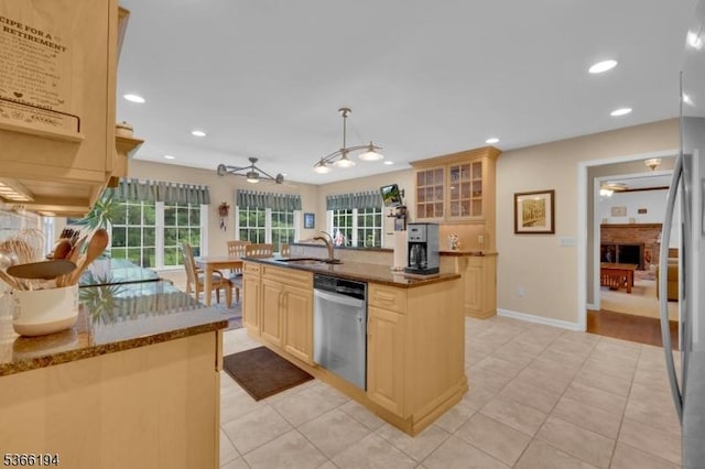 2 Kerry Pl, Mount Olive Twp, NJ 07836 - kitchen featuring stainless steel appliances, light tile patterned flooring, a center island with sink, glass insert cabinets, and a ceiling fan